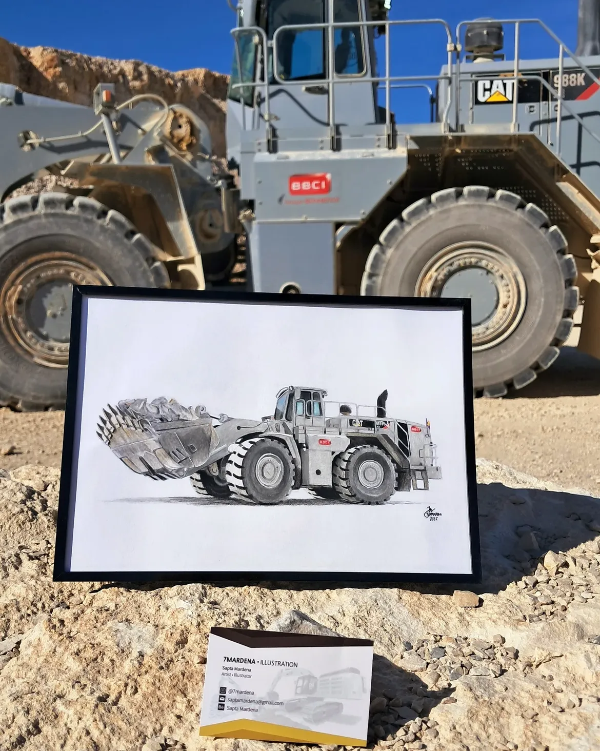 Colored pencil artwork of a CAT 988K XE wheel loader